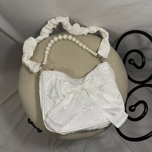 Chic White Clutch with Pearl Handle and Bow
